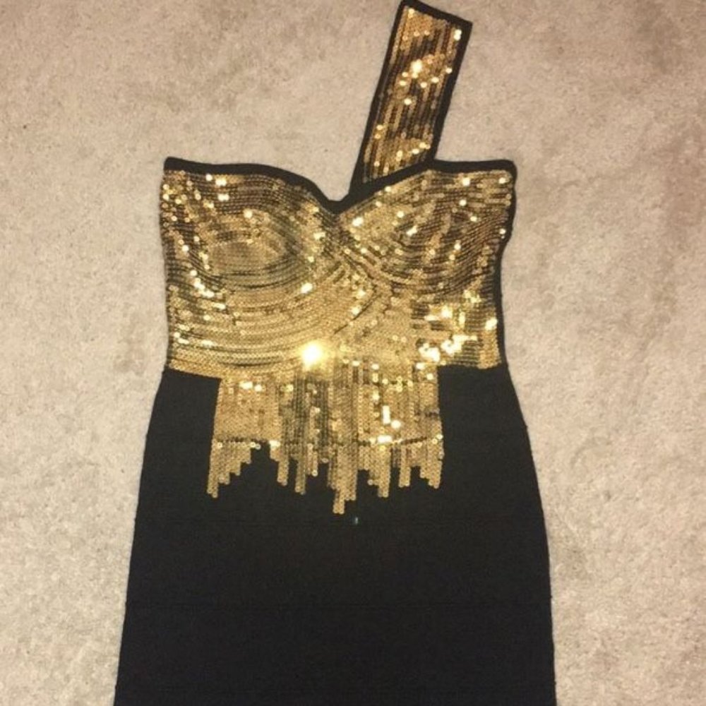 BEBE Black and gold dress size M perfect condition